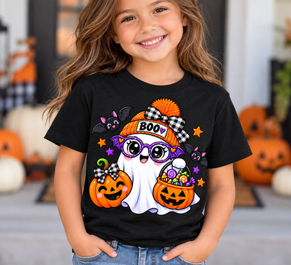 Cute white ghost wearing an orange BOO beanie and purple bat glasses, with smiling jack-o'-lantern pumpkins, candy, and bats, on a toddler Halloween t-shirt