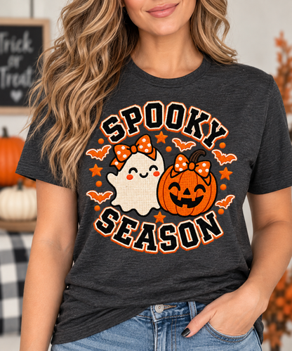 Spooky Season Halloween shirt in [color] with bow ghost and pumpkin graphic